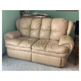 67in camel colored leather look loveseat Matches sofa in previous lot