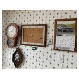 Walnut frame wall calendar, small cork board, barometer, ,and a small Daniel Dakota quartz battery operated , clock with Westminster chime  Pendulum not attached