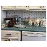 Floral canister set, cake cover, coffee server, coffee carafe, nutmill, small hand-painted Nippon dresser tray w/ powder box & hair receiver and more Nippon tray has been repaired, see photos