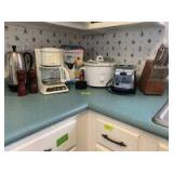 Kitchen appliances includes Mr Coffee, Rival hot air popcorn popper, Rival crockpot, two slice toaster, knife block with Carved Hall knives and more