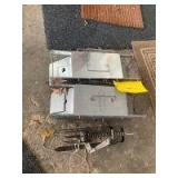 Two small Havahart live traps and a mole trap