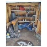 Aluminum extension ladder, two wheel hand truck, garden fertilizer spreader, pop up blind, chains, window screen, gas can, contents of little shed and outside