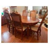 Keller oval oak dining room set Table measures 40 x 60 with (3) 12 inch leaves, 2 captains chairs and 4 straight chairs