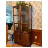 Lighted four door modern oak curio cabinet with two glass shelves Measures 15 deep x 32 wide and 72in tall