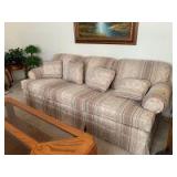 Hickory Hill neutral colored three cushion sofa and pillows Measures 80in wide