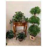 Small round Queen Anne leg table, wind chime and artificial plants