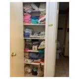 Large quantity of bath and hand towels, washcloths, bedding including flannel sheets, regular sheets, shoe stretchers, bedspreads and more Lots of blues