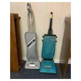 Two upright vacuum cleaners-Oreck XL and a Hoover Runabout