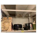 Large and small enamel roasters, West Bend 30 cup coffee maker, stainless steel stock pot, variety of thermoses and a hand meat grinder