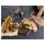 Deer and turkey silhouette decoys, turkey fan, fox hide and a turkey hunting seat