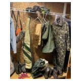 Variety of hunting clothes, duffel bags, camo overalls size 42, rag gun case, over the boot insulated shoe covers, rope, hand warmers and more