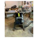 Craftsman 10in table saw with wheel kit and an Align a rip fence This will probably need to be disassembled to carry up the stairs out of the basement