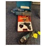 Makita 4in angle grinder Model 9554NB, Weller Model 8200N solder gun and a Bosch Model B7000 detail sander