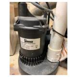 Two sump pumps one looks new and one is definitely used