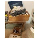 Four boxes and containers full of electrical supplies, a box of turn spindles and some screen door hardware and miscellaneous items