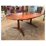 41' round walnut dining table w/ five 12' leaves