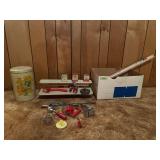 Tin shelf, old spice tins, grater, ice cream scoop, and more