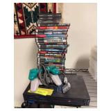 PS2 with two remotes and games