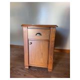 Modern oak end table with single drawer and lower door, magazine storage on back 16x25x24H