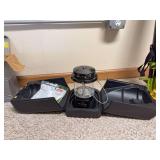 Double mantle camp lantern and Coleman case