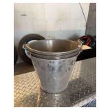 Three stainless steel pails