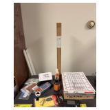 Guitar neck rest, Boss chromatic tuner, Korg combo tuner metronome TM-60, polish cloth, strings, Opti-Visor, etc