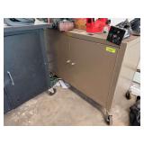 Rolling steel double door cabinet, conduit bender, oil filter wrench, drain pan, trowels, grill brush etc...NOTHING ON TOP