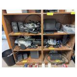 Various electronics includes speakers, portable keyboard, surge protector, wiring, voice recorder, etc
