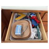 Kitchen drawer stuff, tape dispenser, scissors, rulers, etc...