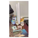 Paper maps, wooden boat models, airport directories, etc