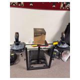 (2) Thrustmaster Simtask Farmsticks and gaming stand This will attach to master unit in Lot 15225