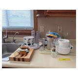 Plastic table service, custard dishes, mugs, glasses, glass cutting boards, Alaska Cutlery bowl and chopper