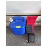 Coleman fresh water can, trailer chocks and half moon poly tandem trailer tire changing block