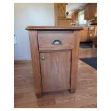 Modern oak end table with single drawer and lower door, magazine storage on back 16x25x24H