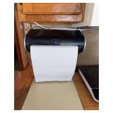 Touchless paper towel dispenser