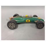 Famous firsts green number 11 racecar