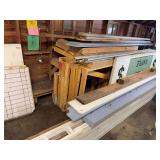 Scrap wood of all kinds, white boards on bottom are 15’ long and were used to make sides of tent boothes, as shown in photo