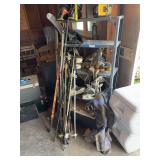 Ice skates, roller blades, ski poles, hockey sticks, golf clubs - and light duty shelf
