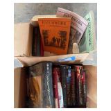 Two boxes of books, including patchwork books