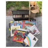 Assortment of vintage records and eight tracks