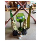 Large green glass vases, two Asian figurines, and a lady head vase