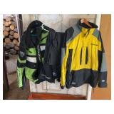 Snowmobile gear, including Polaris coat size XL, arctic cat coat size XL, and Polaris bibs size large