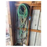 Extension cords hanging on wall