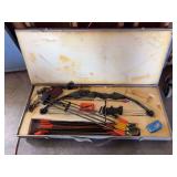 PSE precision shooting equipment ￼ bow with lots of arrows and accessories plus wooden carrying case
