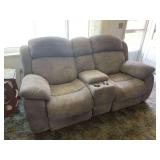 Electric reclining loveseat with center storage console and cupholders plus USB charging ports