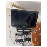 Sanyo flatscreen TV and Sylvania VHS DVD player