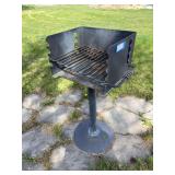 Campsite charcoal grill on pedestal