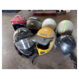 Seven assorted helmets