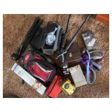 Coleman Camelback, shooting bipod, camera tripod and other outdoor gear, including binoculars and a video camera
