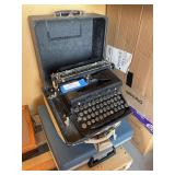 Two vintage and one antique typewriter